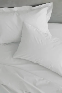 Catherine Lansfield White Easy Iron Percale Flat Sheet 5 Catherine Lansfield White Easy Iron Percale Flat Sheet -Julian Charles PlainDyePercaleWhite FlatSheet IMAGE3